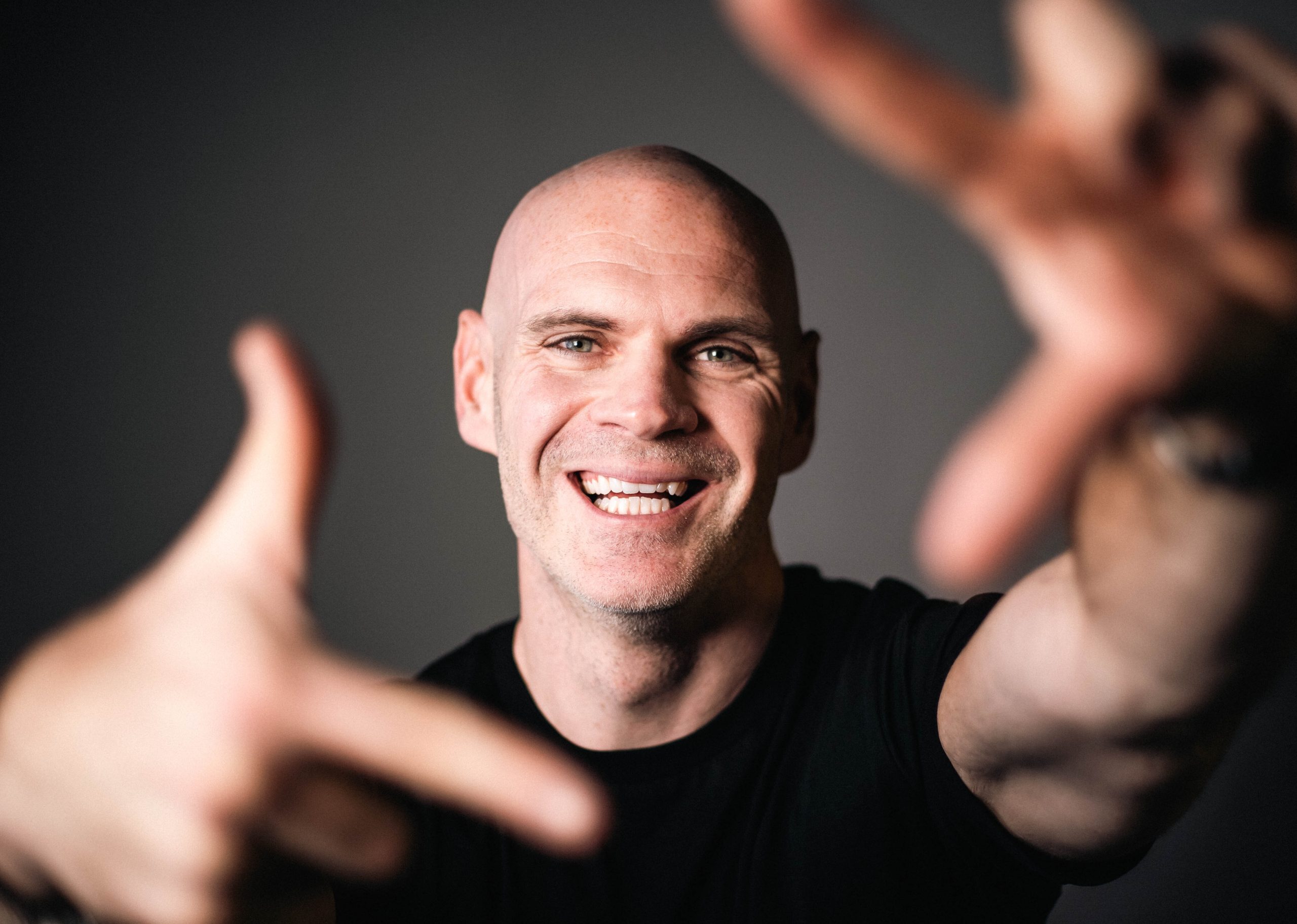 Andy Whyte speaking on stage